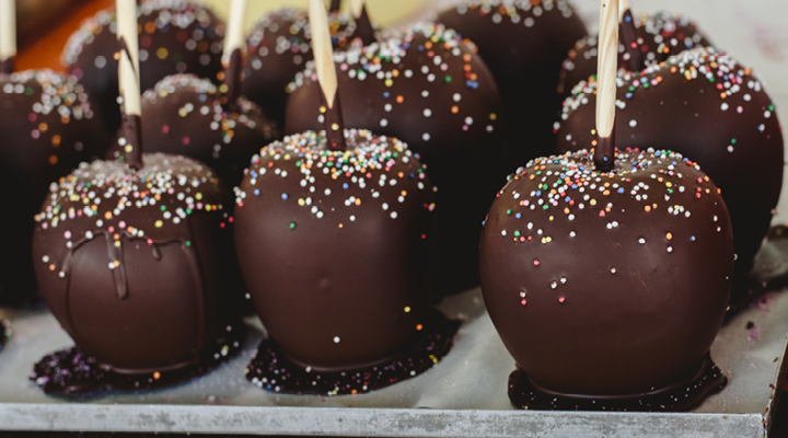 Chocolate-Dipped Apples with sprinkles.