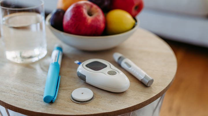 Diabetes supplies on a table ready to be used.