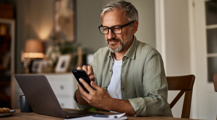 Man checking his dental benefits online.