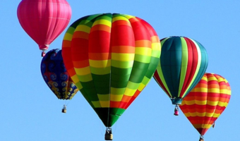 Hot air balloon's flying through the New Mexico sky.