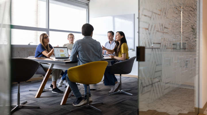 Team members working in a group setting.