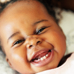 Baby smiling and laughing.